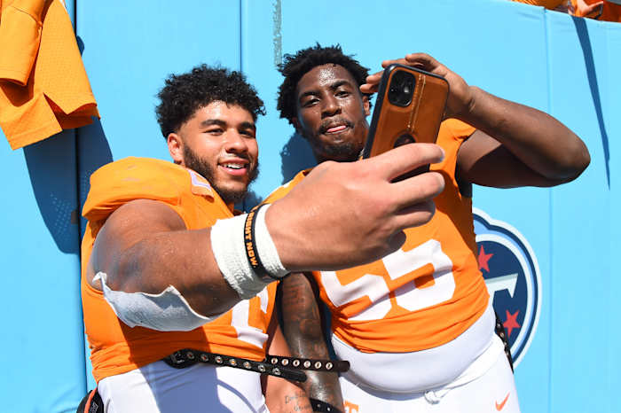 Tennessee Volunteers ILB Aaron Beasley and DL Omarr Norman-Lott after the win against Virginia on September 2nd, 2023, in Nashville, Tennessee. (Photo by Christopher Hanewinckel of USA Today Sports)
